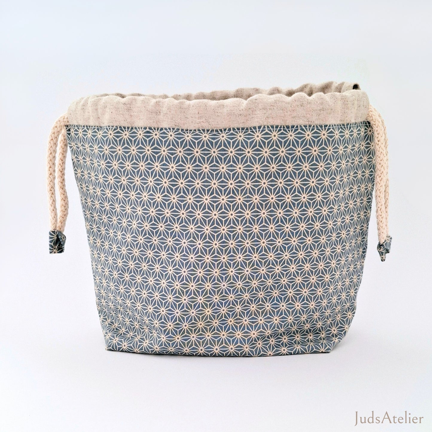 Bossa de labors amb estampat floral en tons ocres