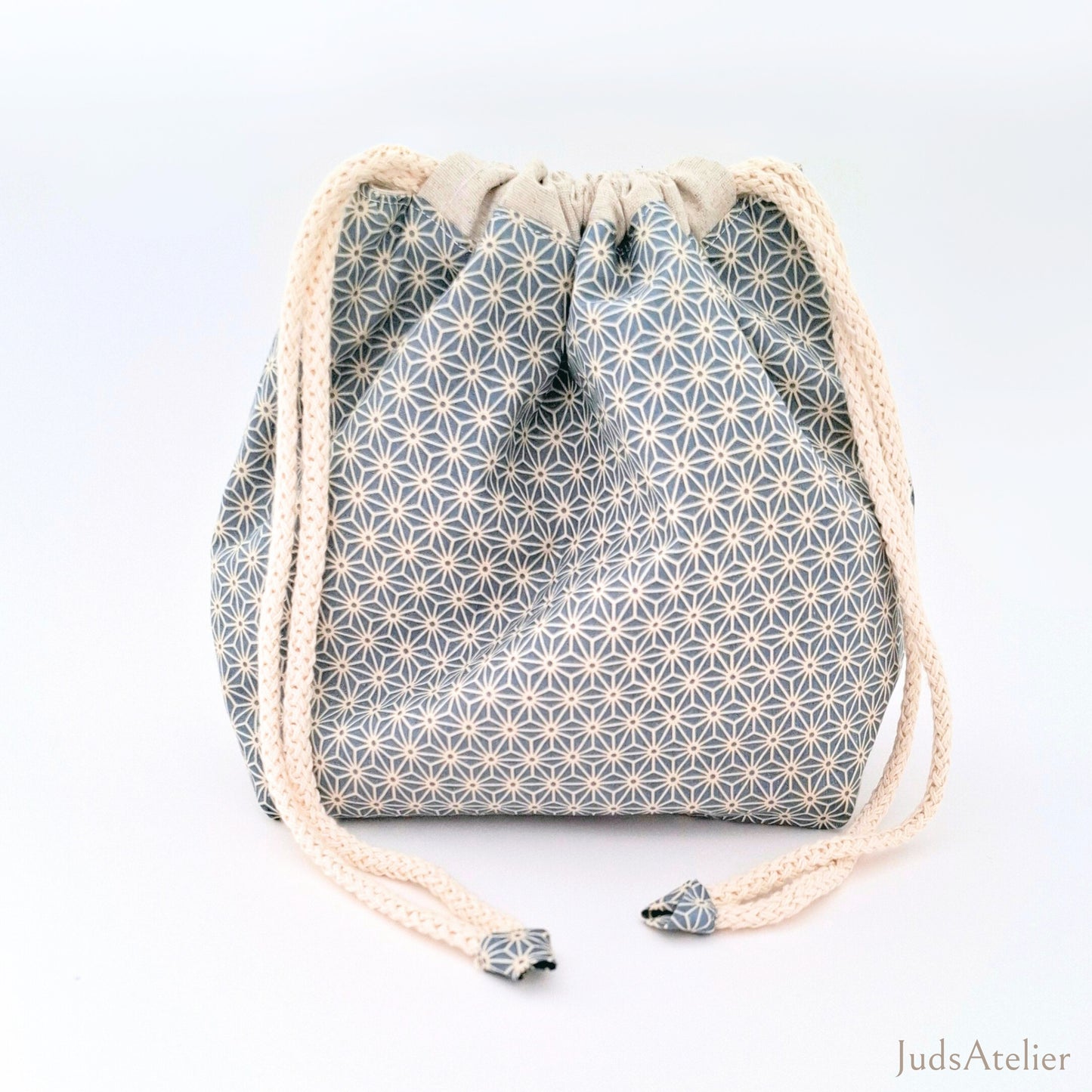 Bossa de labors amb estampat floral en tons ocres
