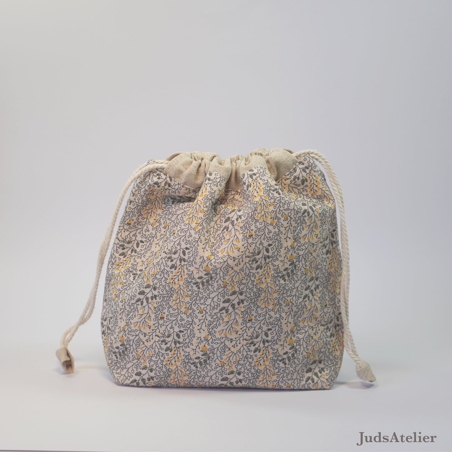 Bolsa de labores modelo ENSUEÑO con estampado floral en tonos ocres