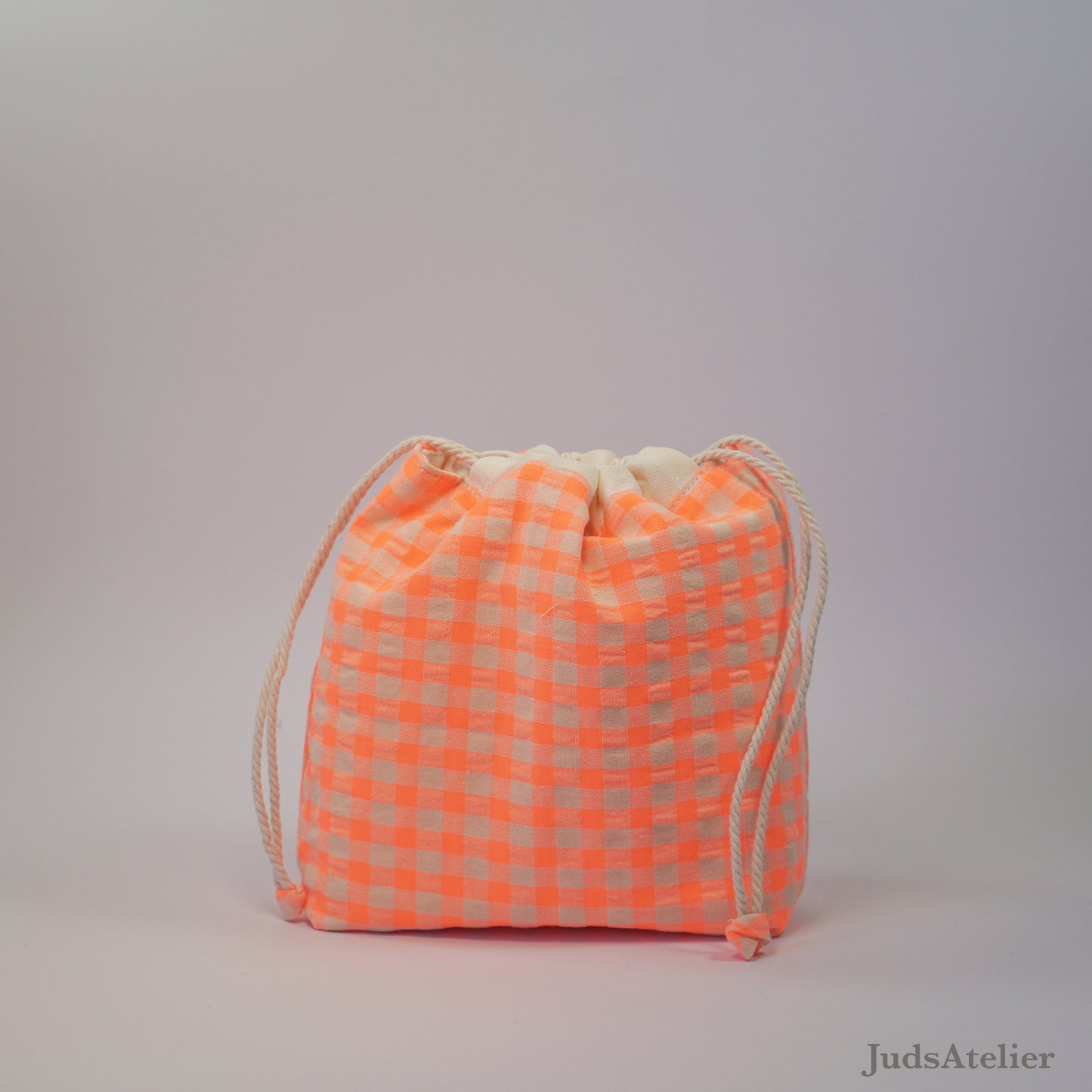 Sewing bag in neon orange gingham fabric