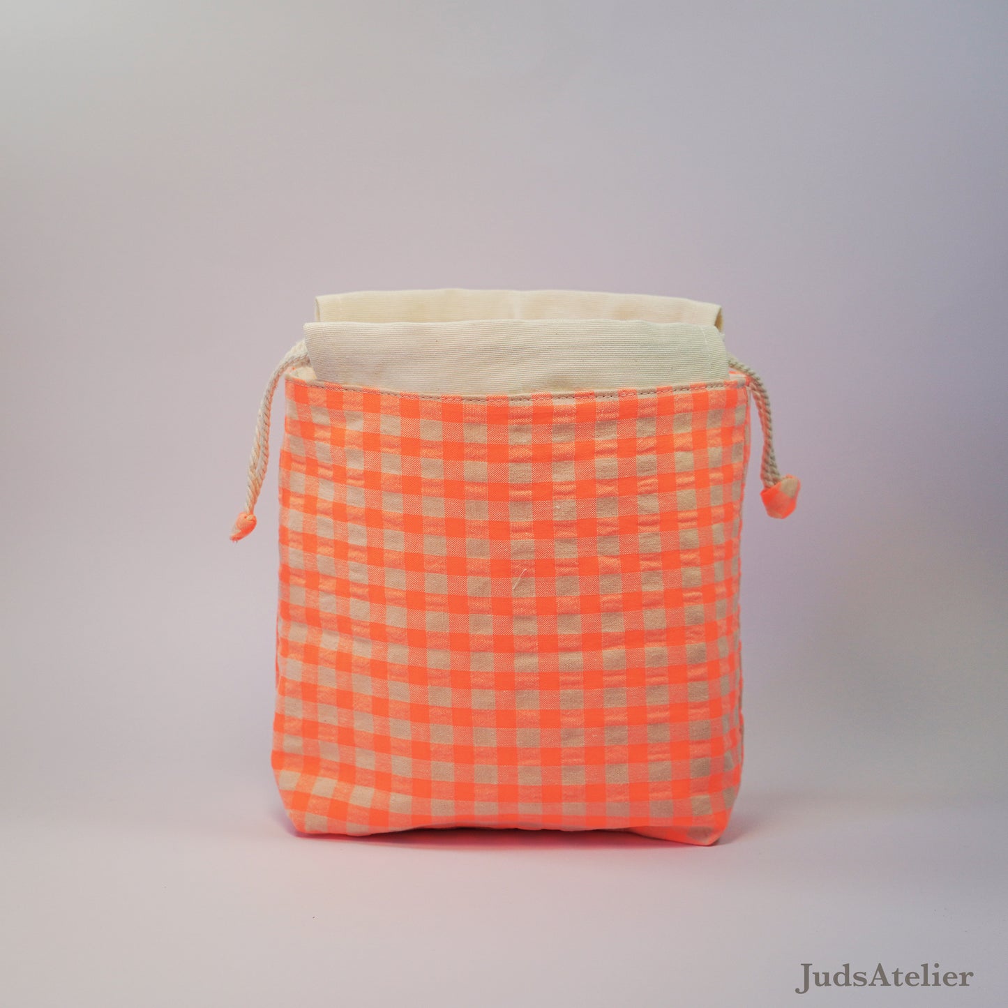 Sewing bag in neon orange gingham fabric